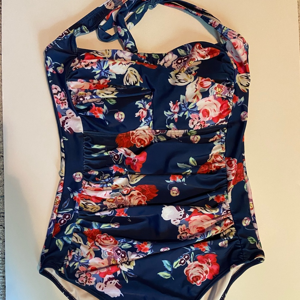 Brand new never worn One piece swimsuit